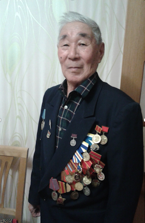 Lev Budaevich with medals (photo courtesy of Radnaev family)